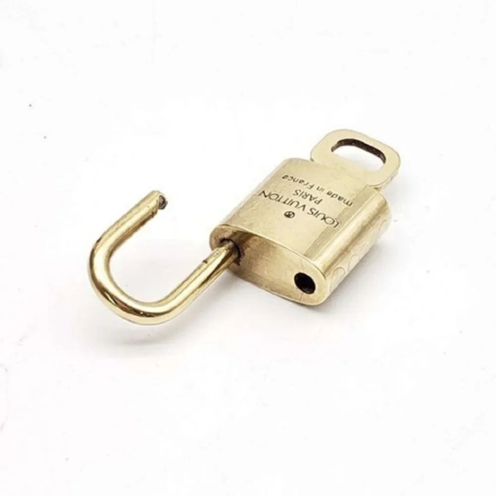 100% Authentic Louis Vuitton Gold Brash 1 Lock and 1 Key